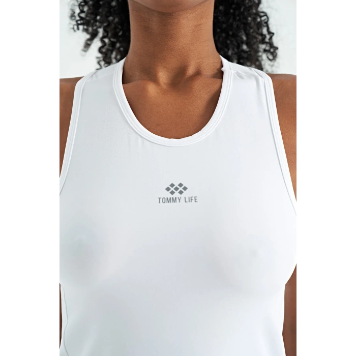 TOMMY LIFE Beyaz Yırtmaç Detaylı O Yaka Sıfır Kollu Standart Kalıp Kadın Spor Atlet - 97256