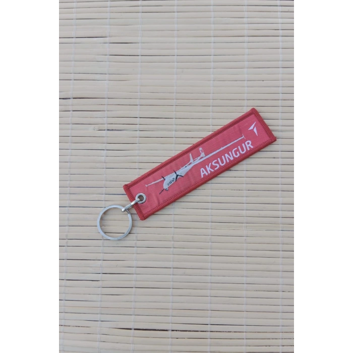 aksungur remove before flight yazili kirmizi beyaz nakis islemeli bez anahtarlik