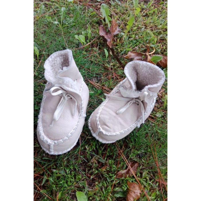 bej renkli hakiki kuzu derisi bagcikli ici polarli organik ortopedik cocuk bebek ilkadim bagcikli patik kanvas sneaker casual deri ayakkabi