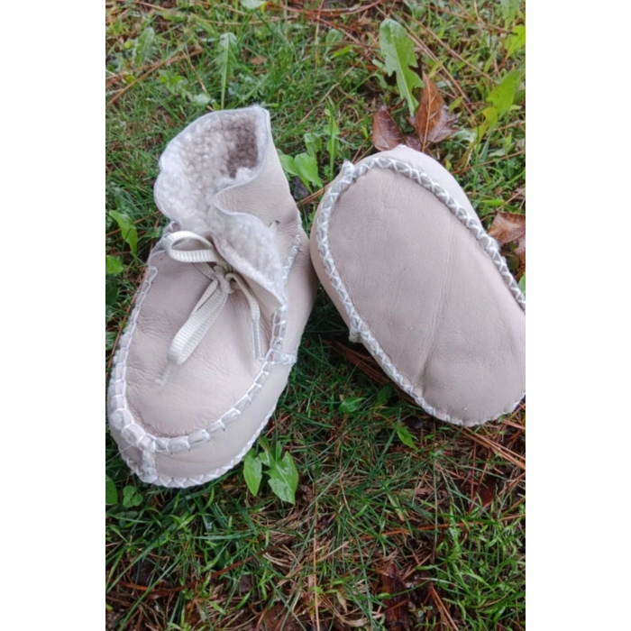 bej renkli hakiki kuzu derisi bagcikli ici polarli organik ortopedik cocuk bebek ilkadim bagcikli patik kanvas sneaker casual deri ayakkabi