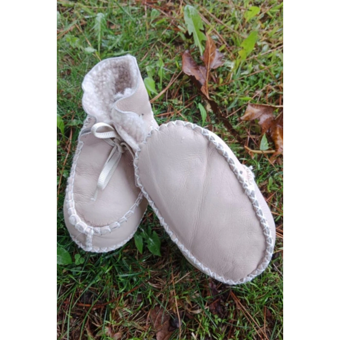 bej renkli hakiki kuzu derisi bagcikli ici polarli organik ortopedik cocuk bebek ilkadim bagcikli patik kanvas sneaker casual deri ayakkabi