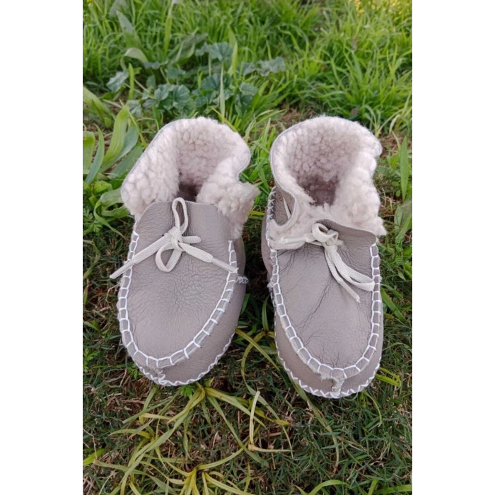 kum renkli hakiki kuzu derisi bagcikli ici polarli organik ortopedik cocuk bebek ilkadim bagcikli patik kanvas sneaker casual deri ayakkabi