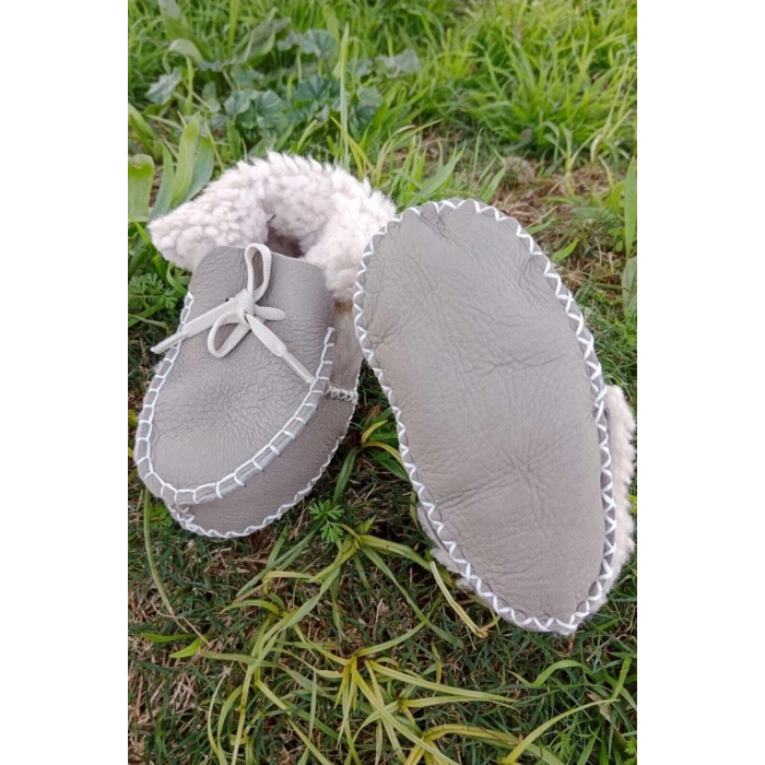 kum renkli hakiki kuzu derisi bagcikli ici polarli organik ortopedik cocuk bebek ilkadim bagcikli patik kanvas sneaker casual deri ayakkabi