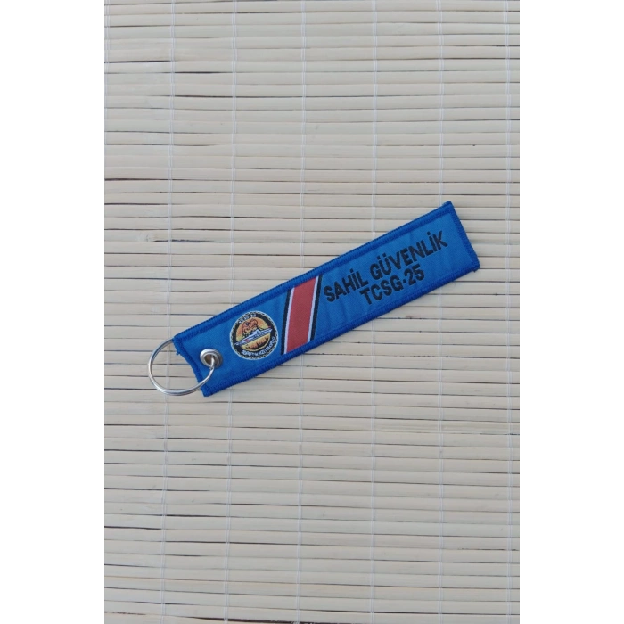 Sahil guvenlik tcsg 25 yazili mavi beyaz nakis islemeli bez anahtarlik