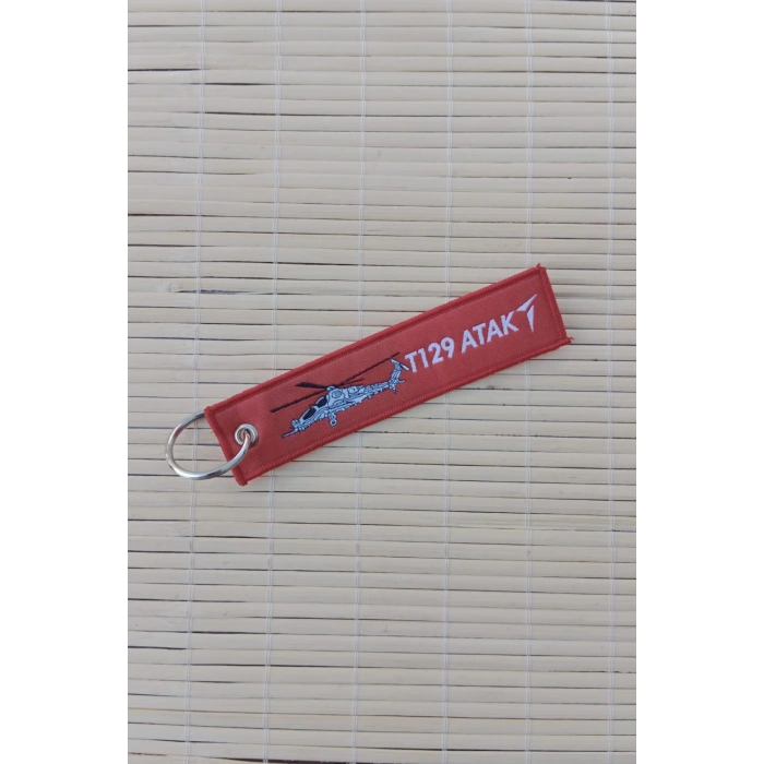 T 129 atak istikbal goklerdedir yazili kirmizi nakis bez anahtarlik