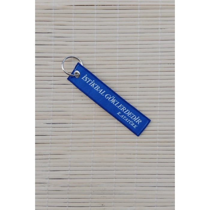 T 129 Atak istikbal Goklerdedir Yazili Lacivert Beyaz Nakis islemeli Bez Anahtarlik