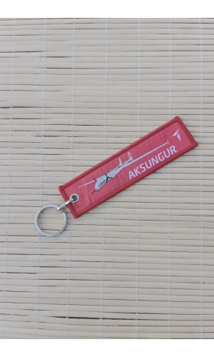aksungur remove before flight yazili kirmizi beyaz nakis islemeli bez anahtarlik