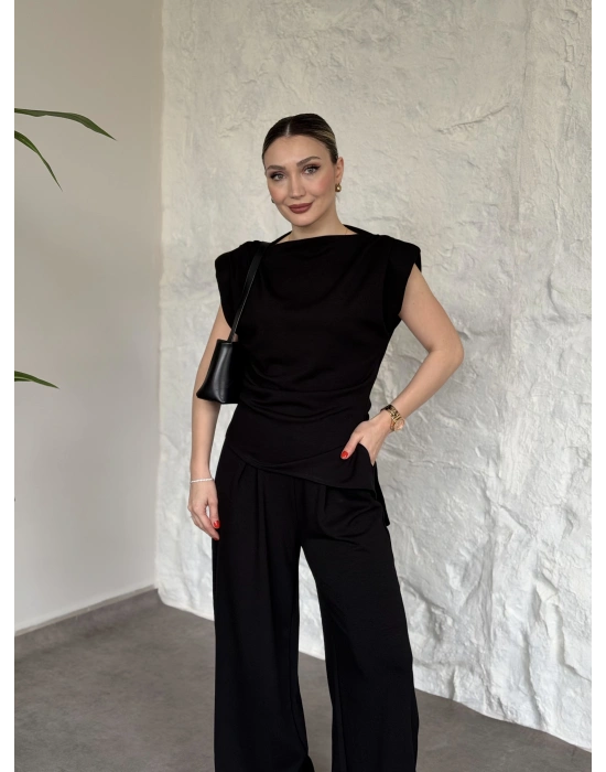 Asimetrik kesim omuzu vatkalı takım siyah