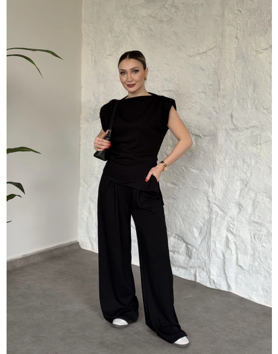 Asimetrik kesim omuzu vatkalı takım siyah