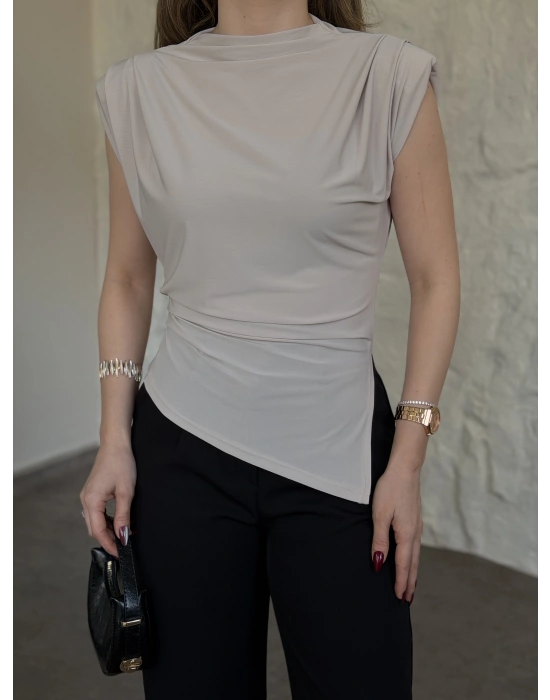 Vatkalı pileli asimetrik bluz taş