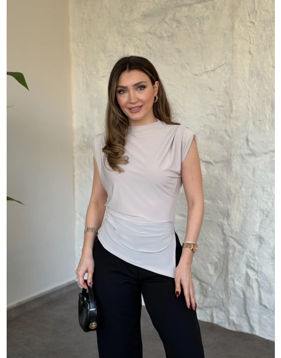 Vatkalı pileli asimetrik bluz taş