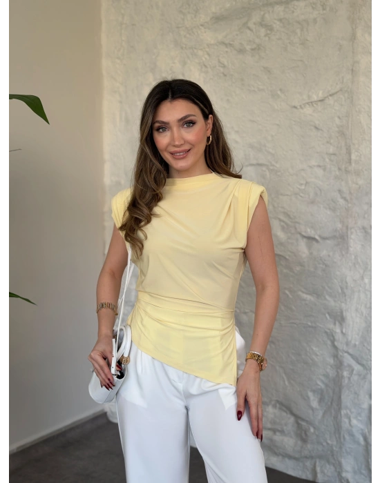 Vatkalı pileli asimetrik bluz sarı