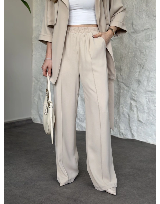 Trenç görünümlü belinden kuşaklı tivil takım krem