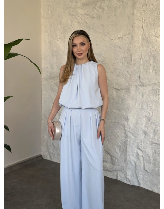 Boyun büzgü ip detaylı takım bebek mavisi