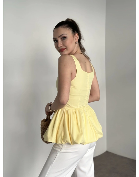 Belden oturtmalı balon etekli tasarim bluz sarı