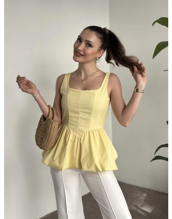 Belden oturtmalı balon etekli tasarim bluz sarı