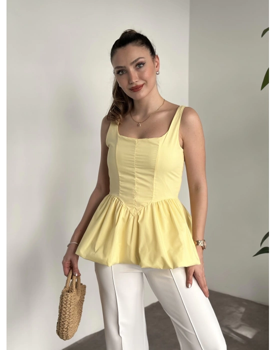 Belden oturtmalı balon etekli tasarim bluz sarı