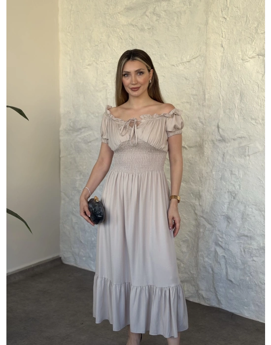 Beli gipeli madonna yaka önden bağlamalı elbise krem