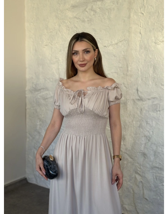 Beli gipeli madonna yaka önden bağlamalı elbise krem