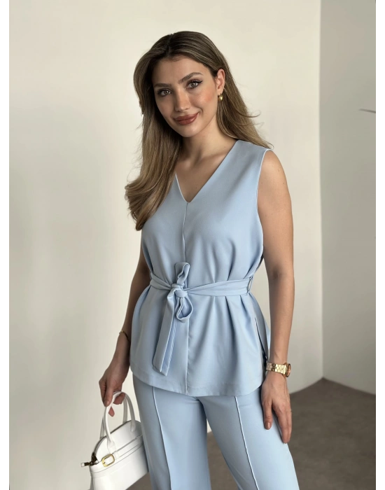 Belinden kuşaklı v yaka dabıl takım bebek mavisi