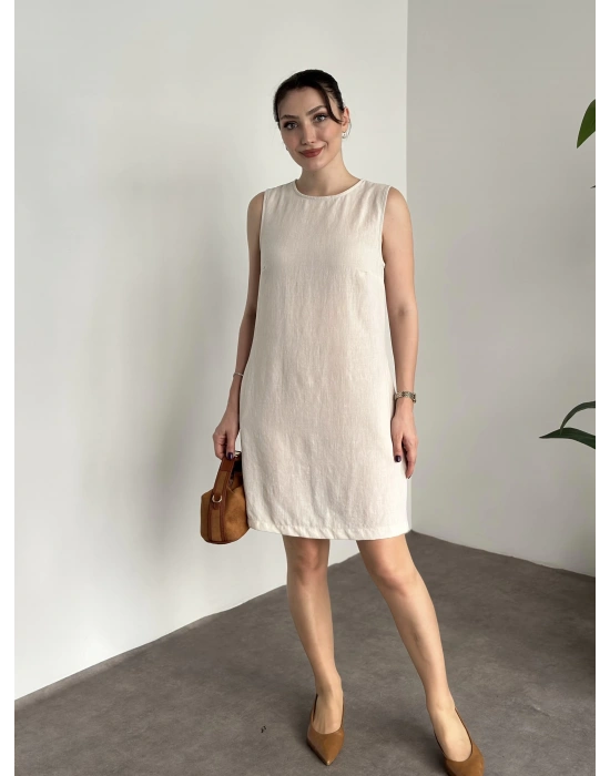 Bisiklet yaka cepli kısa keten elbise krem