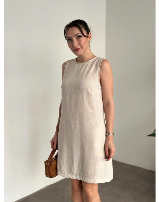 Bisiklet yaka cepli kısa keten elbise krem