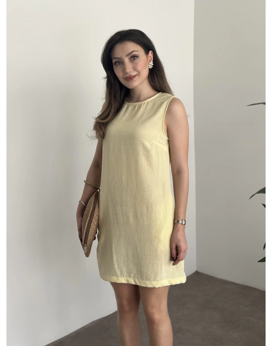 Bisiklet yaka cepli kısa keten elbise sarı