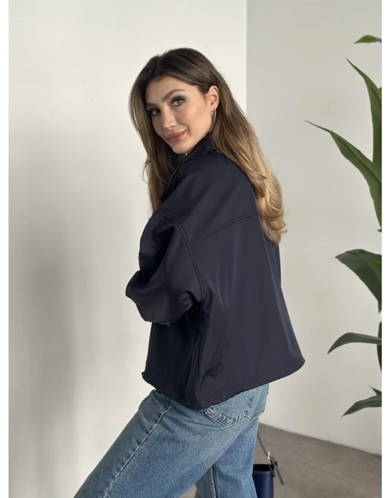 Bol kesim cep detaylı yağmurluk ceket lacivert