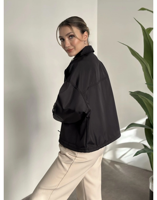 Bol kesim cep detaylı yağmurluk ceket siyah