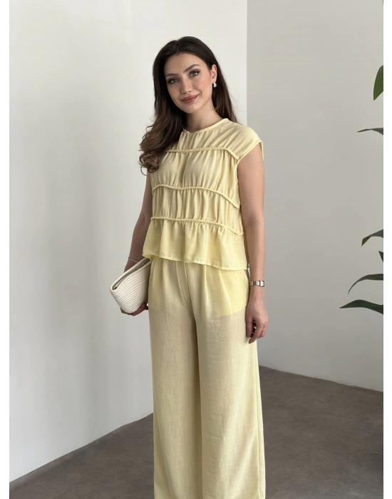 Kat detaylı sıfır kol keten takım sarı