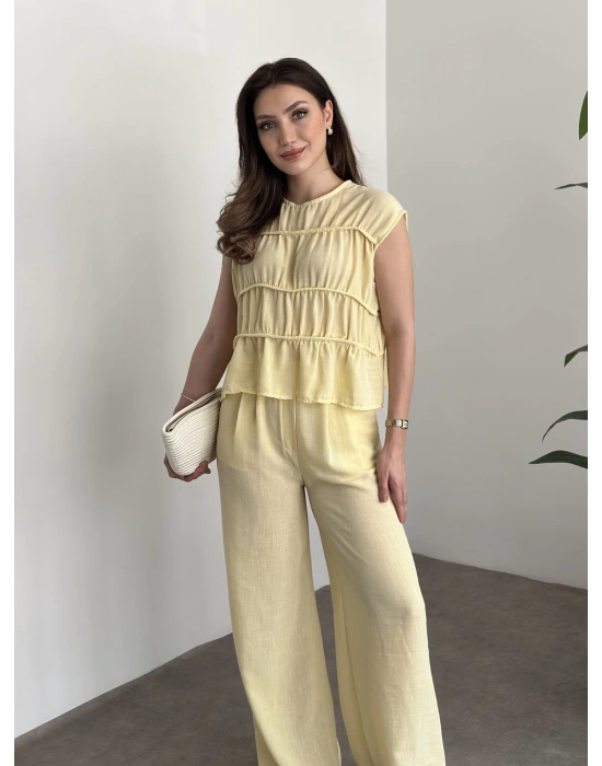 Kat detaylı sıfır kol keten takım sarı