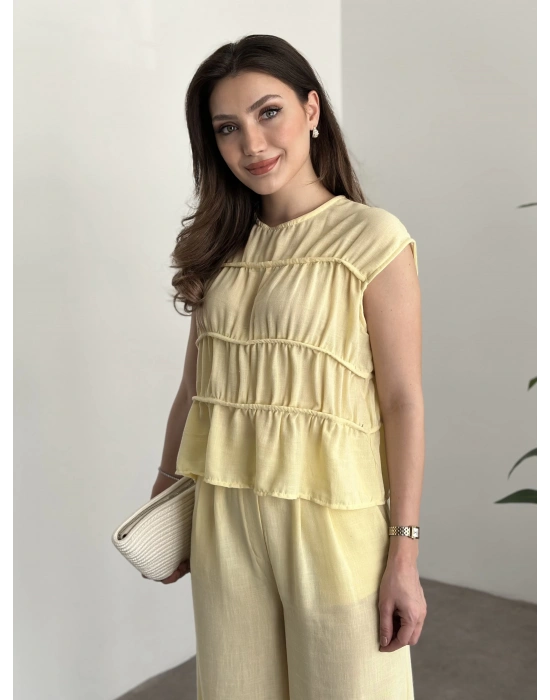 Kat detaylı sıfır kol keten takım sarı