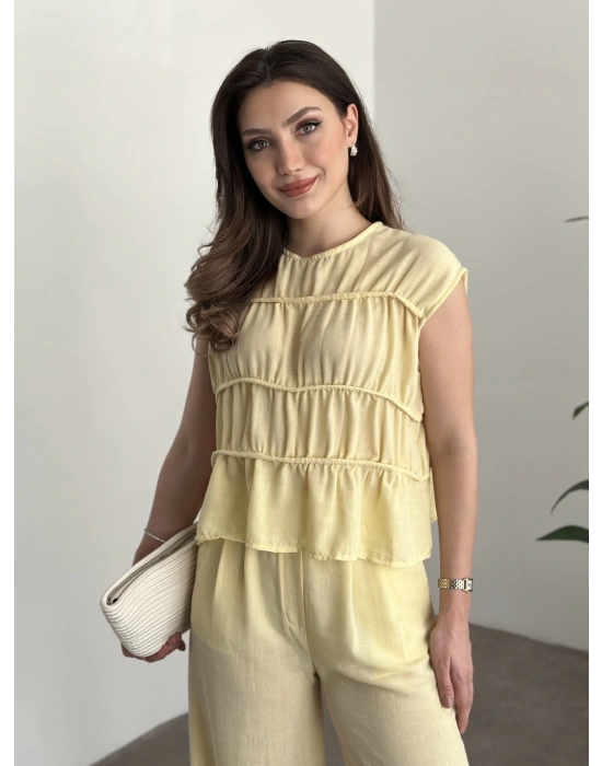 Kat detaylı sıfır kol keten takım sarı