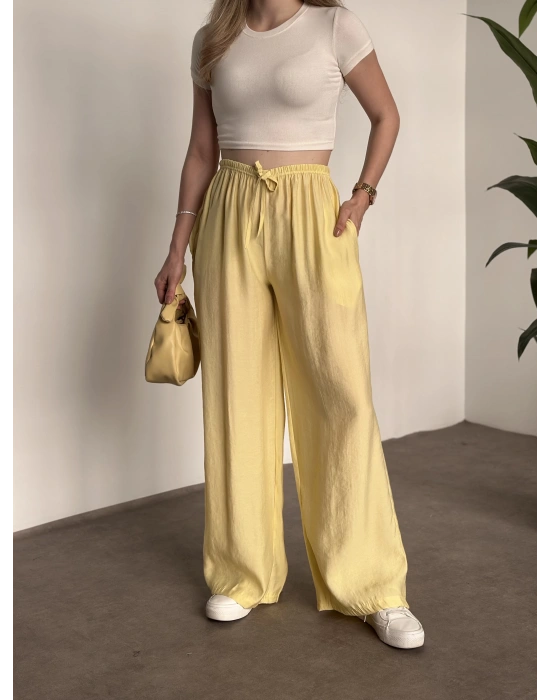 Marka etiketli tensel kumaş şalvar pantolon sarı