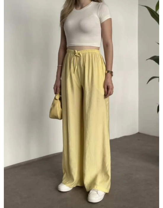 Marka etiketli tensel kumaş şalvar pantolon sarı