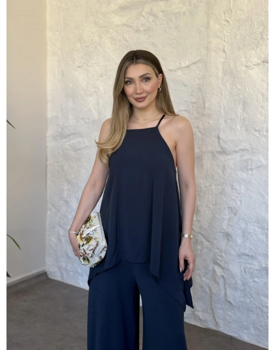 Marka model Halter yaka asimetrik kesim tulum lacivert