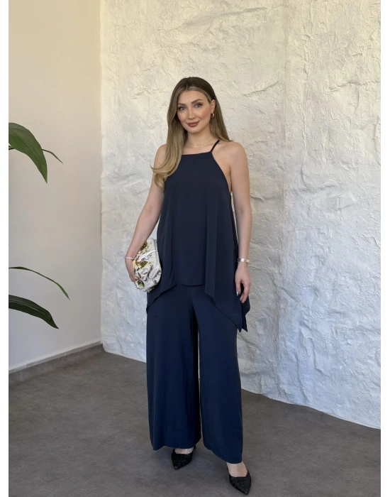 Marka model Halter yaka asimetrik kesim tulum lacivert