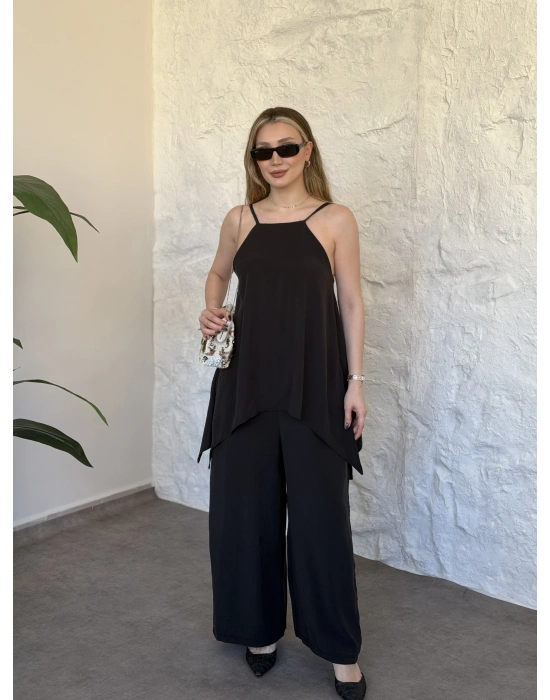 Marka model Halter yaka asimetrik kesim tulum siyah