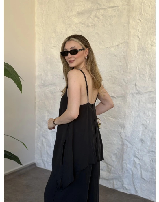 Marka model Halter yaka asimetrik kesim tulum siyah