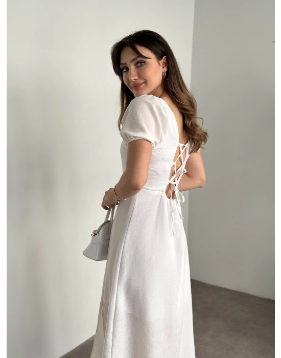 Sırt dekolteli ve yırtmaçlı keten elbise beyaz