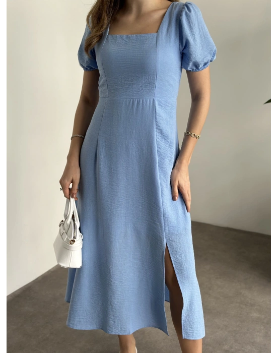 Sırt dekolteli ve yırtmaçlı keten elbise mavi