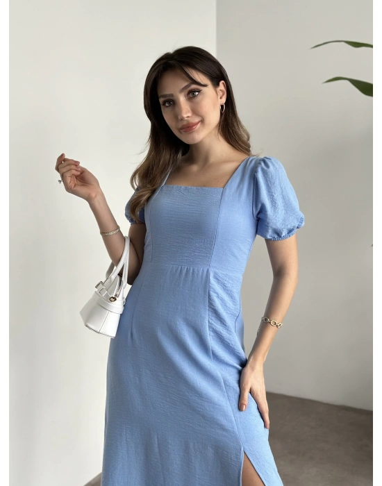 Sırt dekolteli ve yırtmaçlı keten elbise mavi