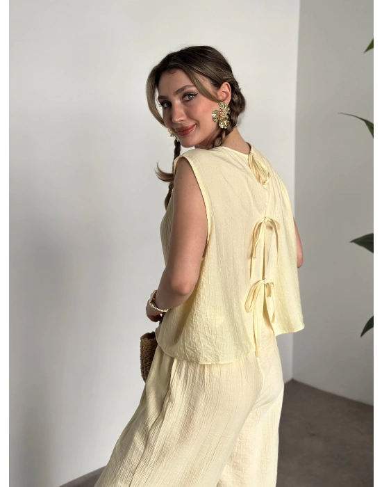 Sırtı bağlama dekolte detaylı tensel kumaş takım sarı