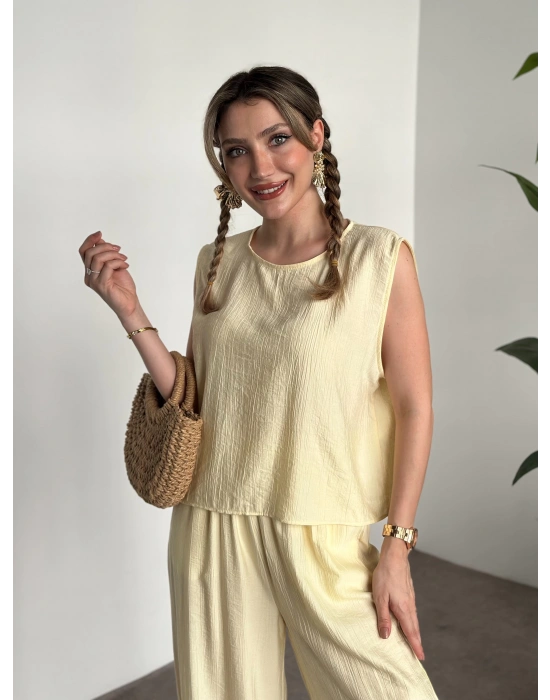 Sırtı bağlama dekolte detaylı tensel kumaş takım sarı