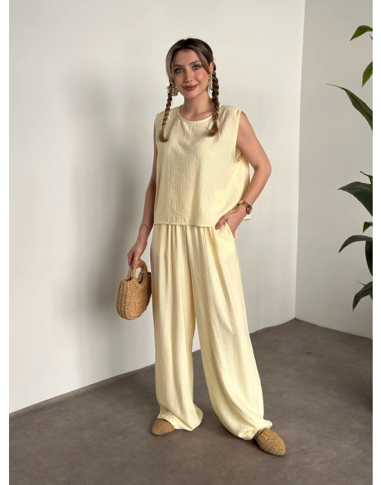 Sırtı bağlama dekolte detaylı tensel kumaş takım sarı