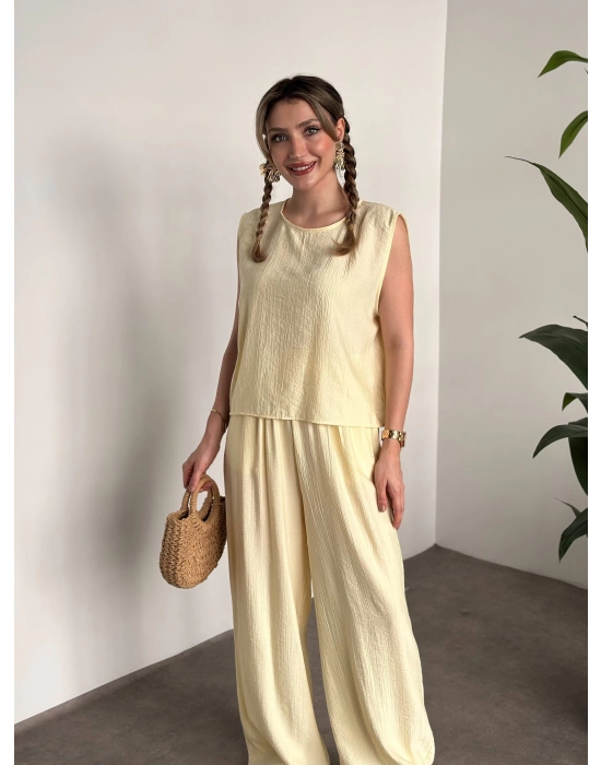 Sırtı bağlama dekolte detaylı tensel kumaş takım sarı