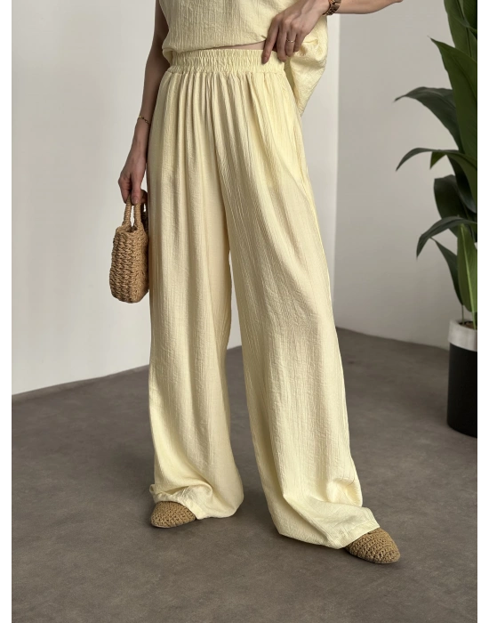 Sırtı bağlama dekolte detaylı tensel kumaş takım sarı