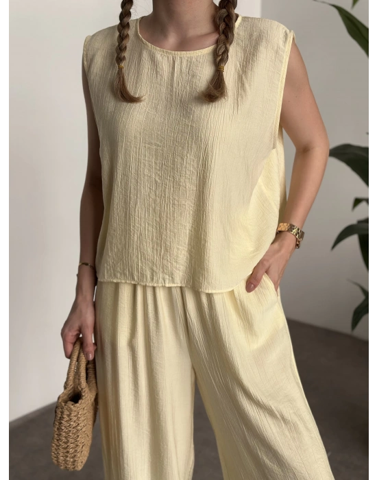 Sırtı bağlama dekolte detaylı tensel kumaş takım sarı