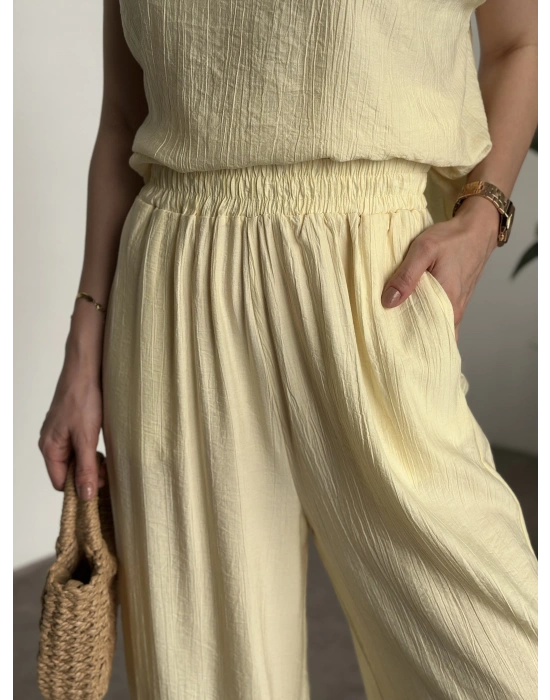 Sırtı bağlama dekolte detaylı tensel kumaş takım sarı