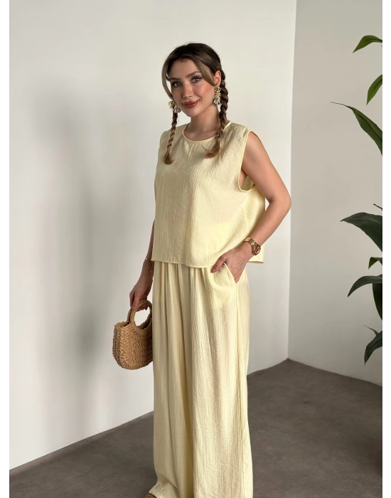 Sırtı bağlama dekolte detaylı tensel kumaş takım sarı